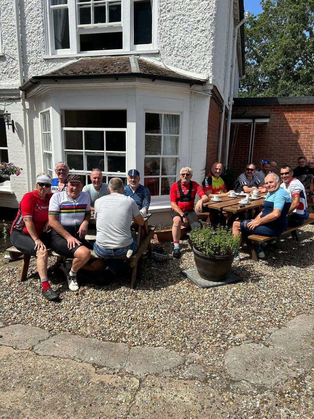 Customers enjoying refreshments in the outdoor seating area at Lincoln's Tea & Coffee House in Hingham.